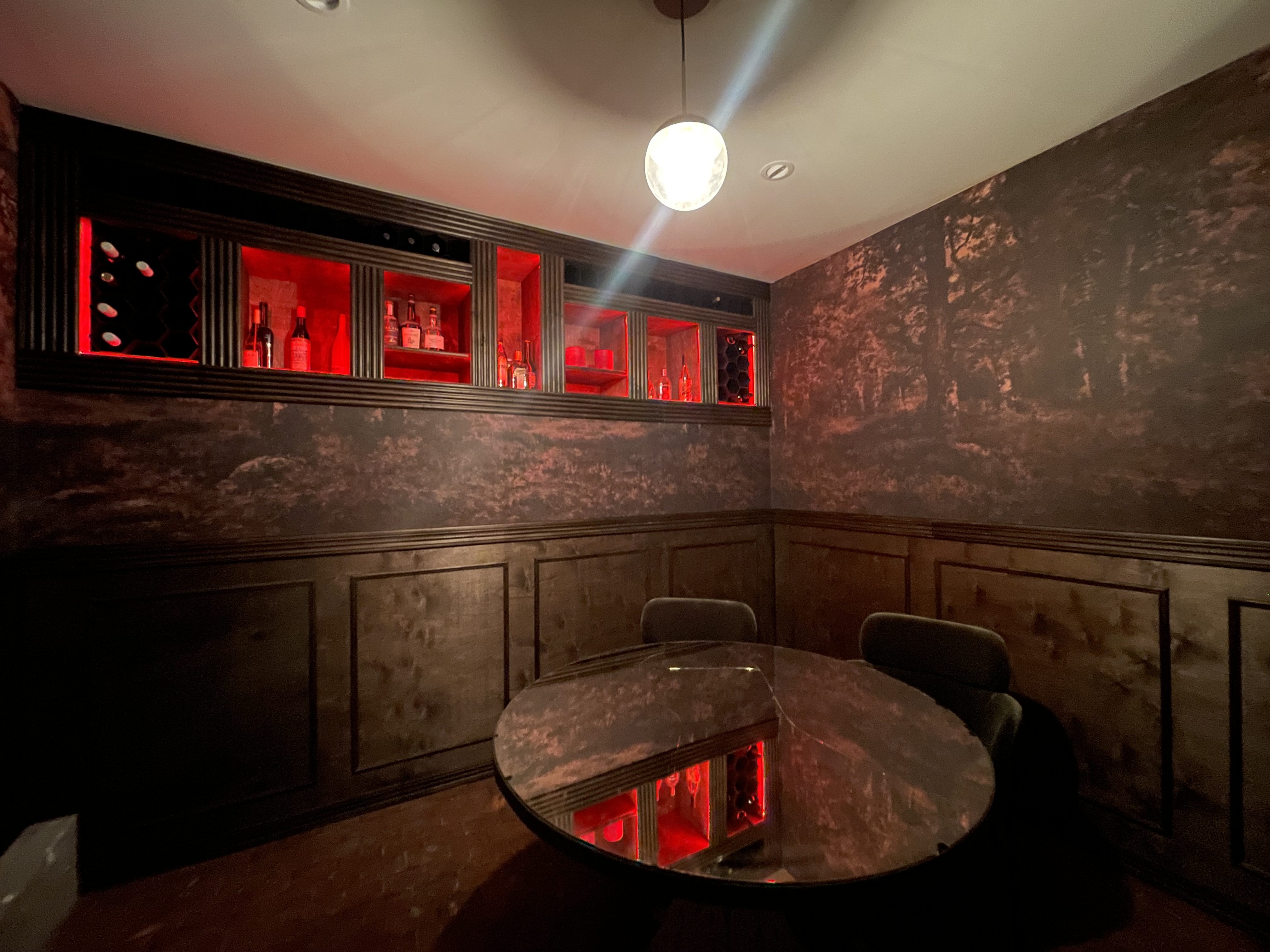 Custom tequila tasting room and bar with integrated lighting and art installation, Denver Colorado
